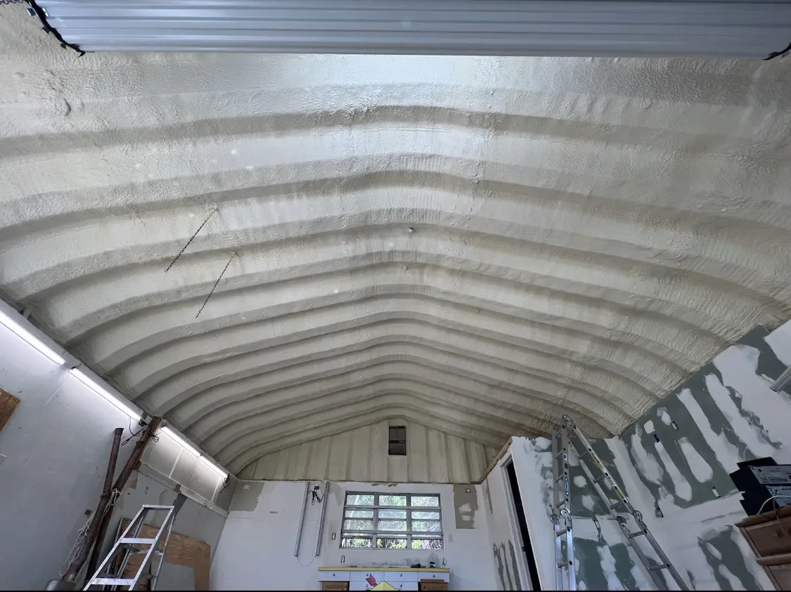 Spray polyurethane foam applied to the underside of a metal roof deck in San Francisco